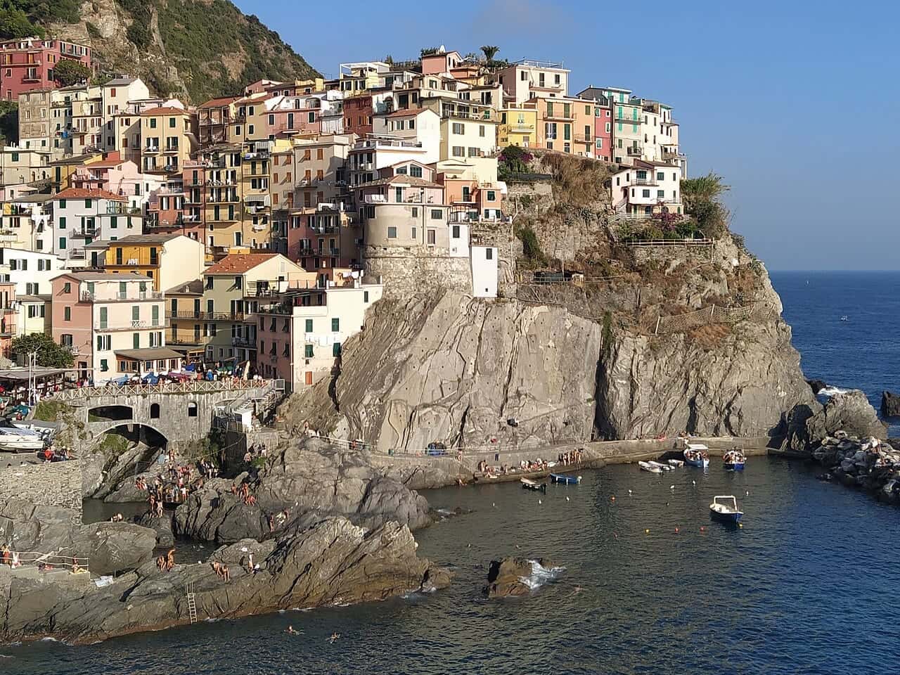Colorful houses of Manarola on the Italian coast, above the sea